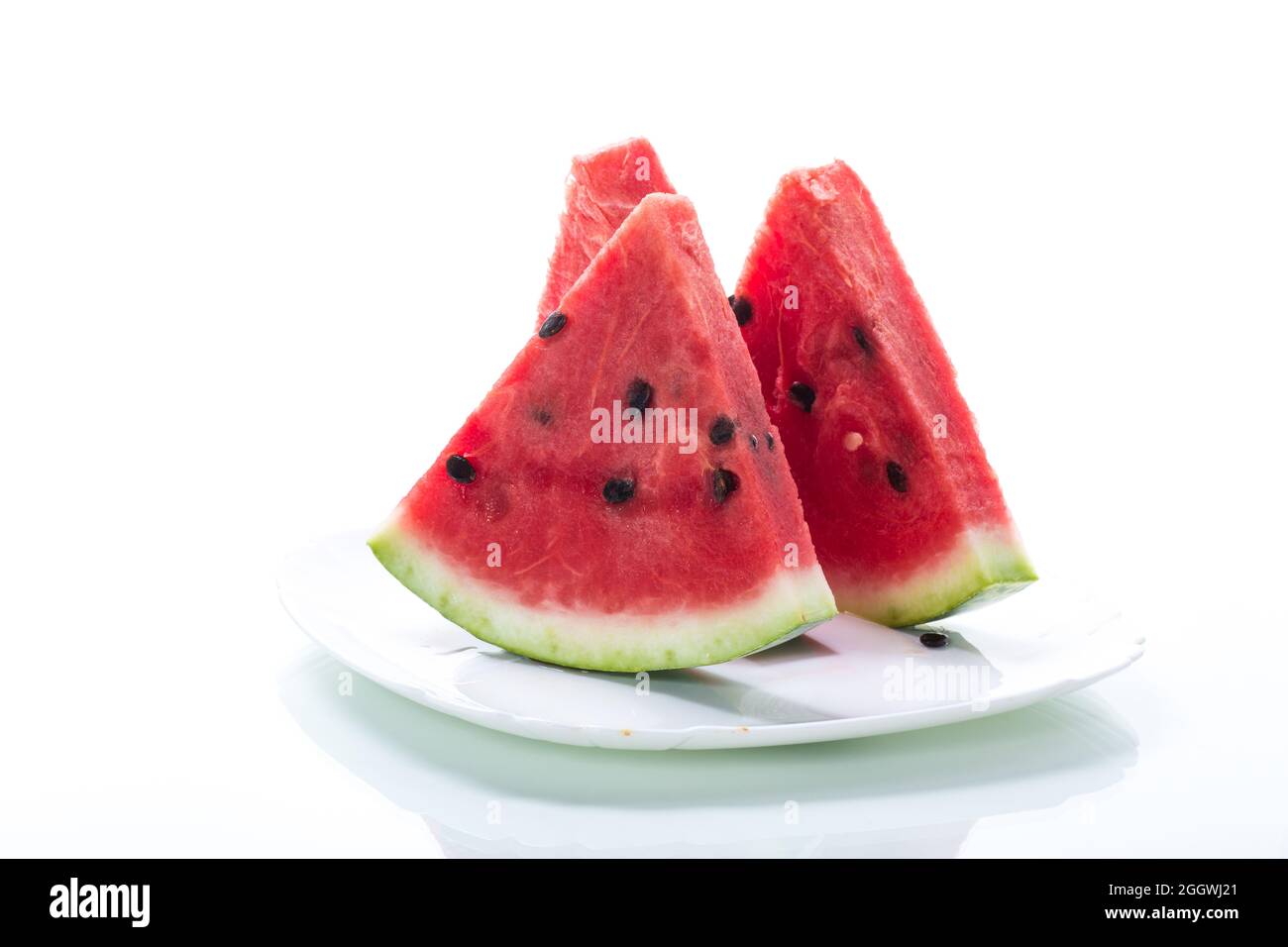 pieces of fresh ripe red watermelon on white background Stock Photo - Alamy