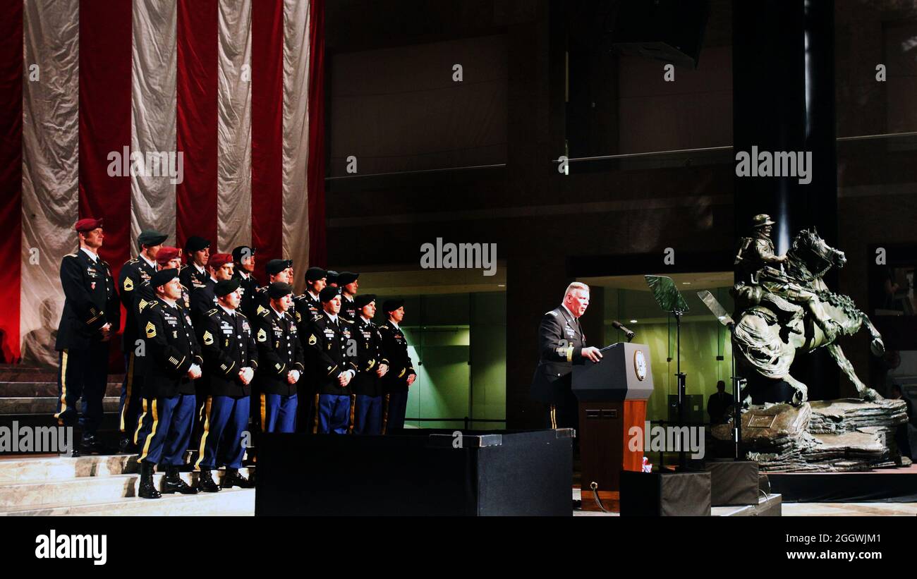 Lt. Gen. John Mulholland, commander of the U.S. Army Special Operations Command and former commander of Task Force Dagger, addresses the audience during the dedication and unveiling ceremony for the De Oppresso Liber statue at the Winter Garden Hall in Two World Financial Center near Ground Zero, Nov. 11. Members of Task Force Dagger; a special operations team made up Green Berets from 5th Special Forces Group (Airborne), aircrew members from the 160th Special Operations Aviation Regiment (Airborne), and combat controllers from Air Force Special Operations Command; joined Vice President Joseph Stock Photo