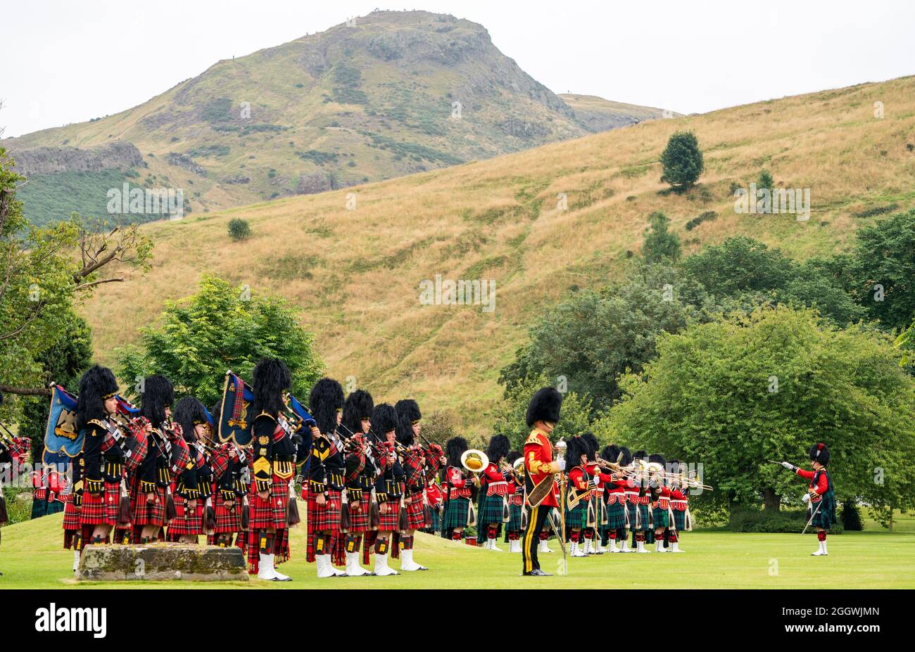 The massed pipes and drums during a service in the garden of the Palace