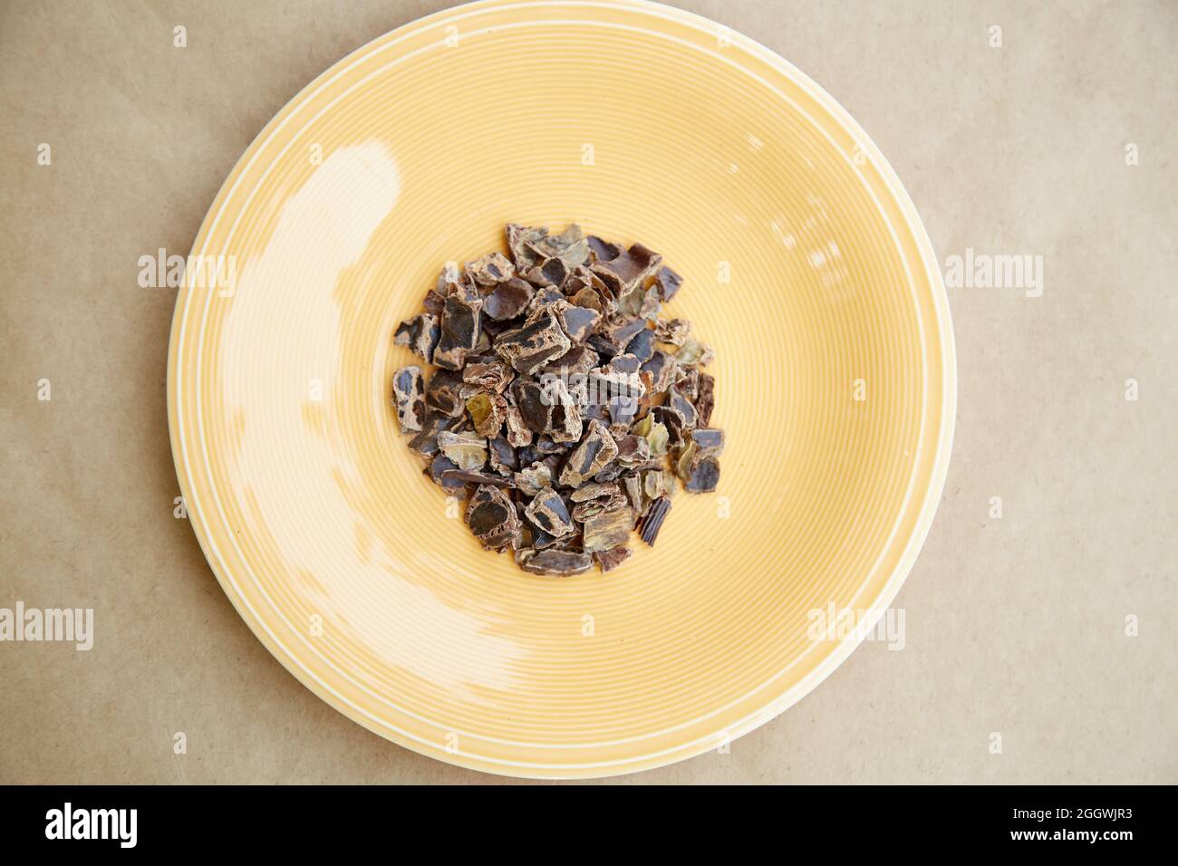 Carob - plant-based alternative - natural product on the plate. Organic antioxidants and protein. Top view. High quality photo Stock Photo