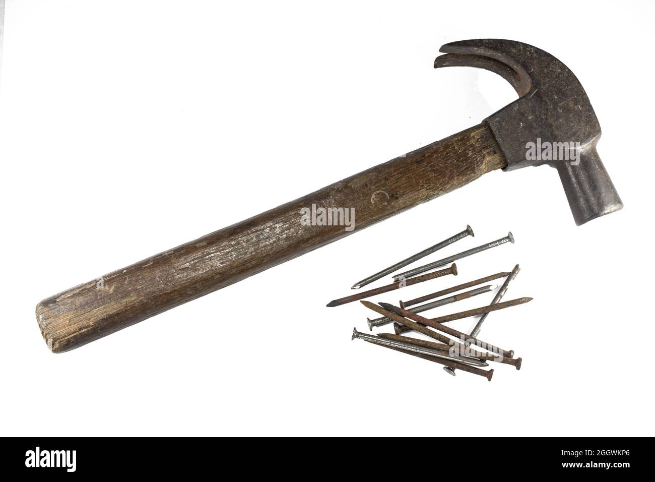 vintage rusty old hammer and a lot of old rusty metal nails tools for ...