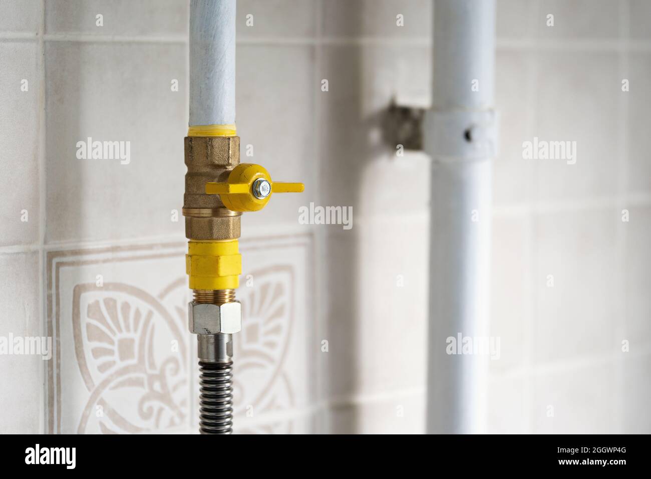 Gas valve on the gas pipe on the kitchen Stock Photo - Alamy