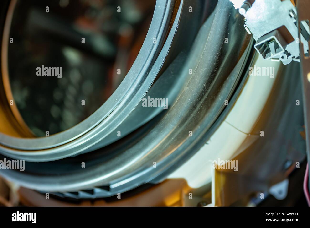 Selective Focus on the gasket mount of a front loading washing machine
