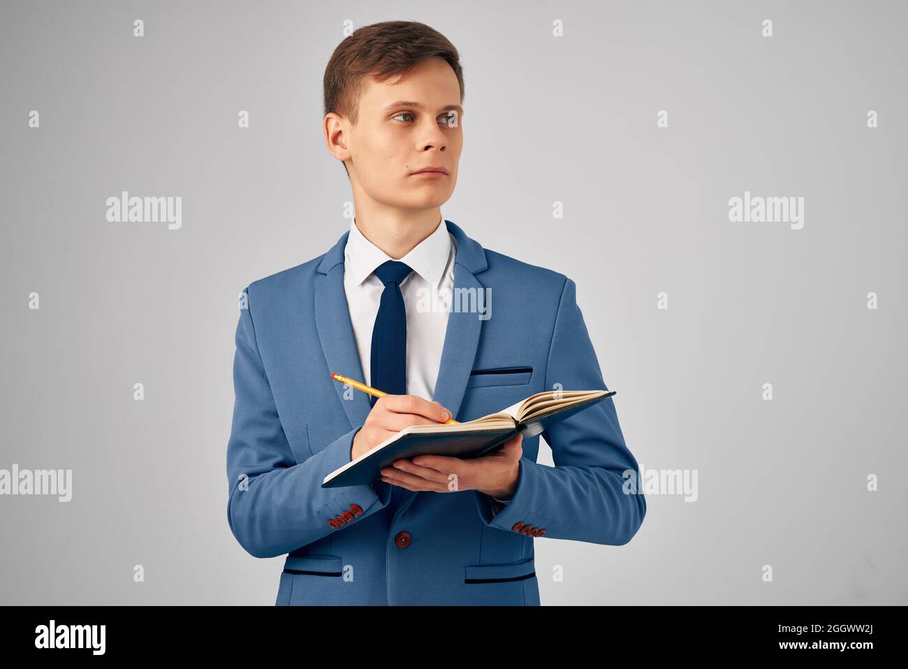 manager with notepad in hand documents work official Stock Photo - Alamy
