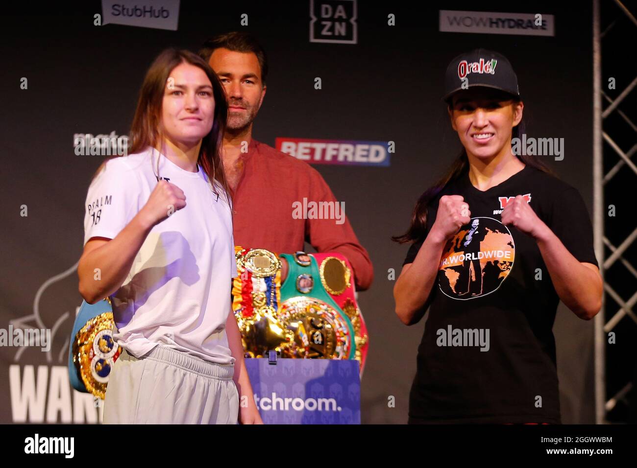 Leeds, UK. 03rd Sep, 2021. New Dock Hall, Armouries Drive, Leeds, West Yorkshire, 3rd September 2021 Katie Taylor and Jennifer Han pose and face-off during the weigh-in for the upcoming fight at Emerald Headingley Stadium in Leeds. Credit: Touchlinepics/Alamy Live News Stock Photo