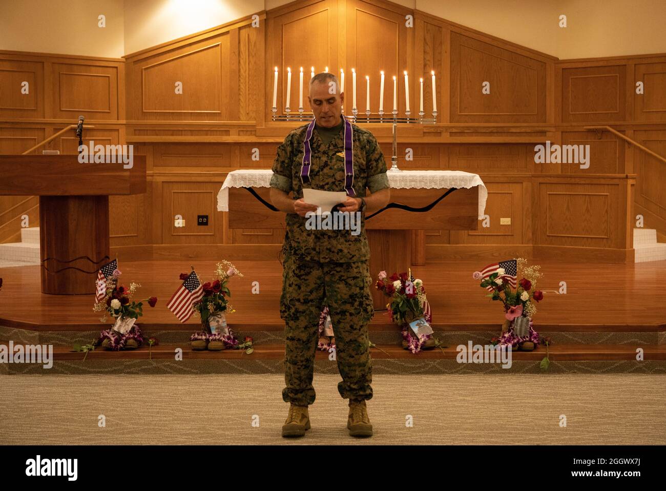 U.S. Navy Cmdr. Edward M. Gorman, base chaplain, Marine Corps Base Hawaii, leads a memorial prayer service and candlelight vigil aboard MCBH, Aug. 29, 2021. The event was held to honor and remember the 13 service members who were killed in Afghanistan on Aug. 26, 2021. (U.S. Marine Corps photo by Gunnery Sgt. Orlando Perez) Stock Photo