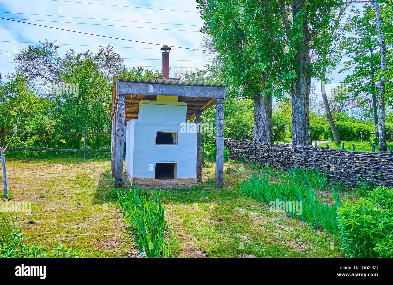 The outdoor adobe stove, located in yard of the farmstead, Pereiaslav Scansen, Pereiaslav, Ukraine Stock Photo