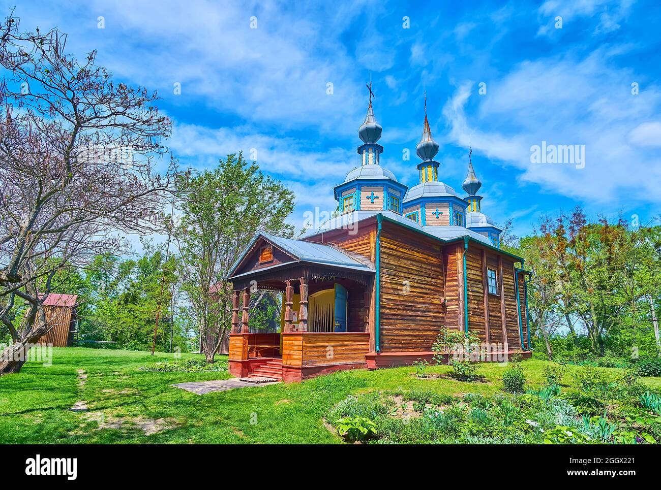 The carved wooden porch of the medieval timber church, located in ...