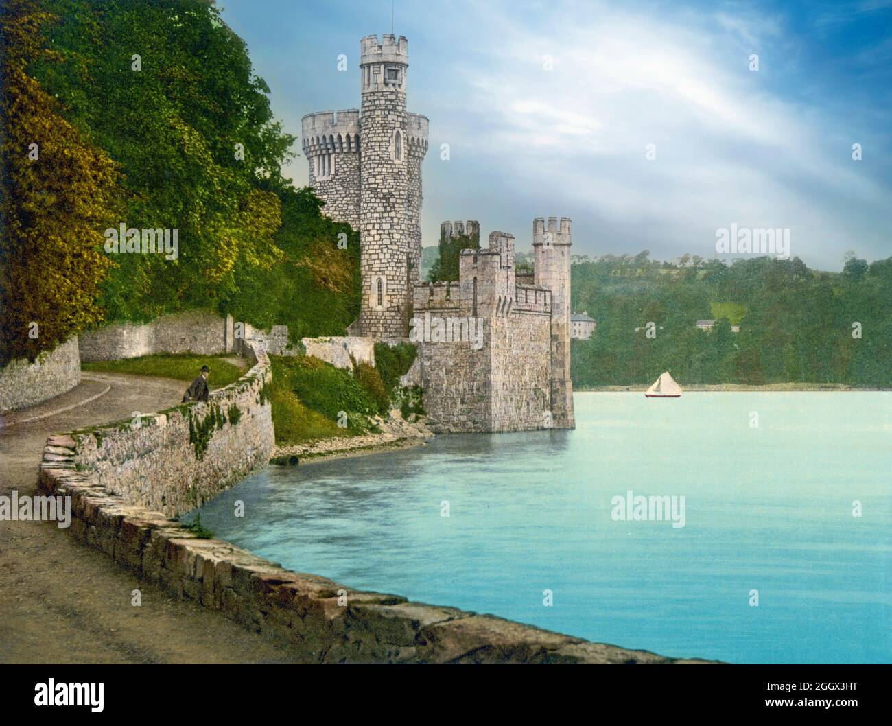 An early 20th century view of Blackrock Castle at Blackrock, about 2 km from Cork City centre on the banks of the River Lee in Ireland, developed as a coastal defence fortification in the 16th century to protect upper Cork Harbour and port. In the 20th century it was used as a private residence, offices, rowing club headquarters, and restaurant. The building was reacquired by Cork Corporation in 2001, and work commenced on renovating and re-purposing the complex as an observatory and museum. Stock Photo