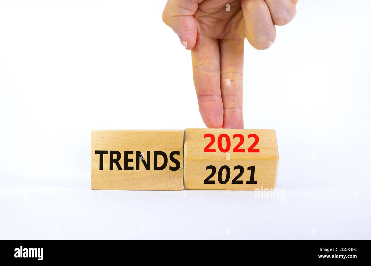 2022 Trends New Year Symbol Businessman Turns A Wooden Cube And Changes Words Trends 2021 To Trends 2022 Beautiful White Background Copy Space Stock Photo Alamy New Year 2022 Trends