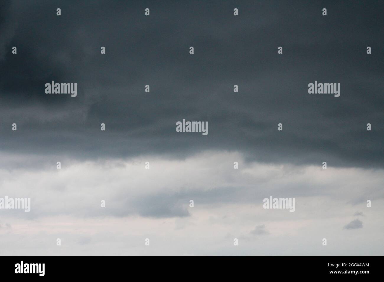 Dark sky and dramatic black cloud before rain comming. Stock Photo