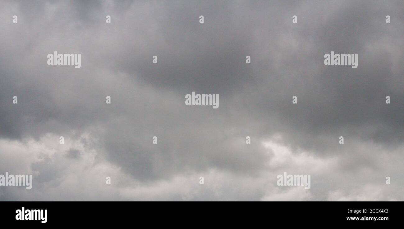 Dark sky and dramatic black cloud before rain comming. Stock Photo