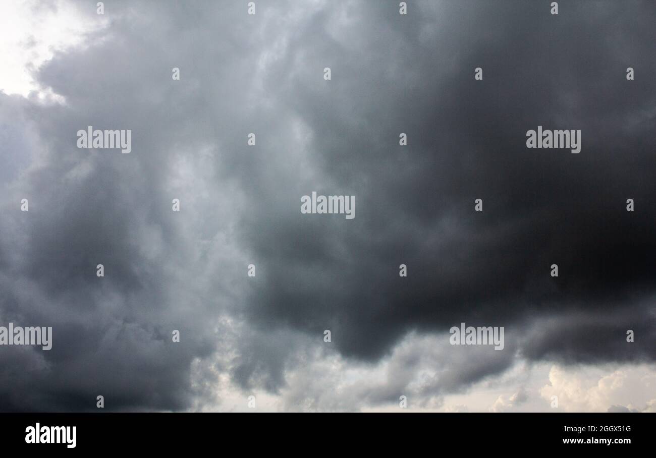 Dark sky and dramatic black cloud before rain Stock Photo - Alamy