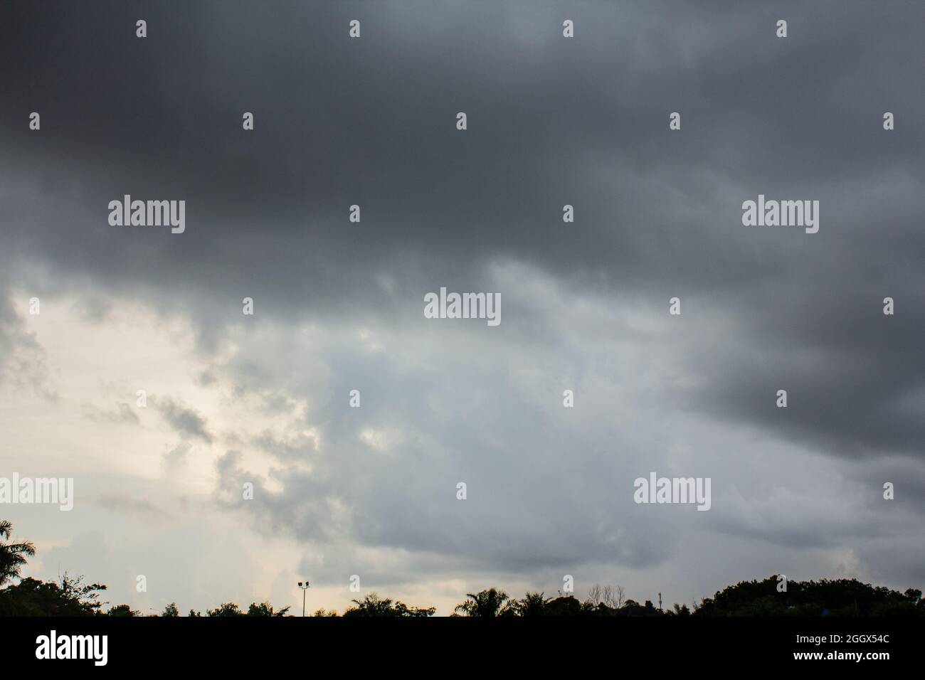 Dark sky and dramatic black cloud before rain Stock Photo - Alamy