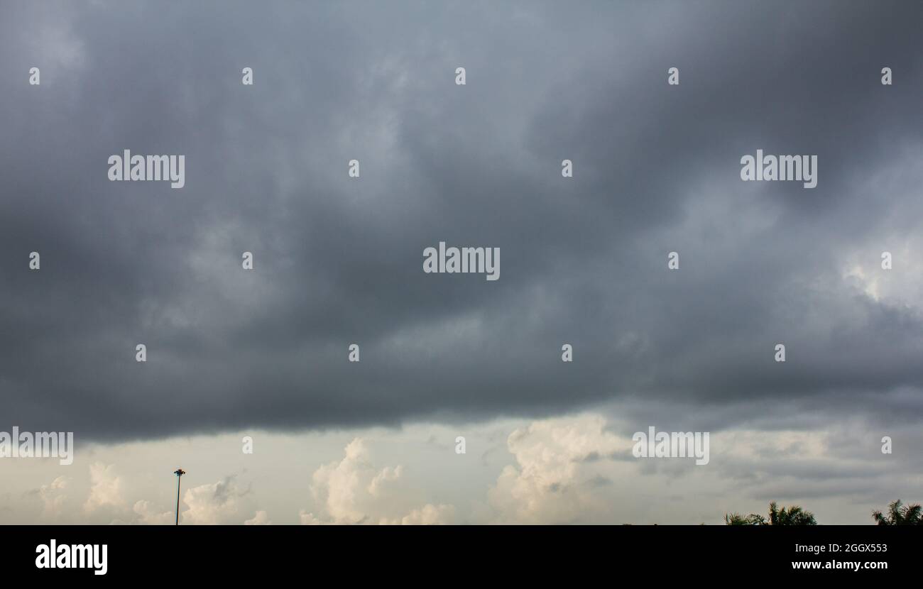 Dark sky and dramatic black cloud before rain Stock Photo - Alamy