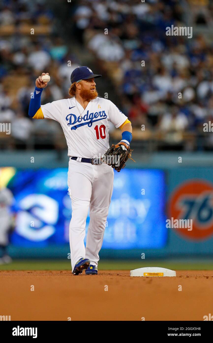 Los Angeles Dodgers third basemen Justin Turner throws the ball