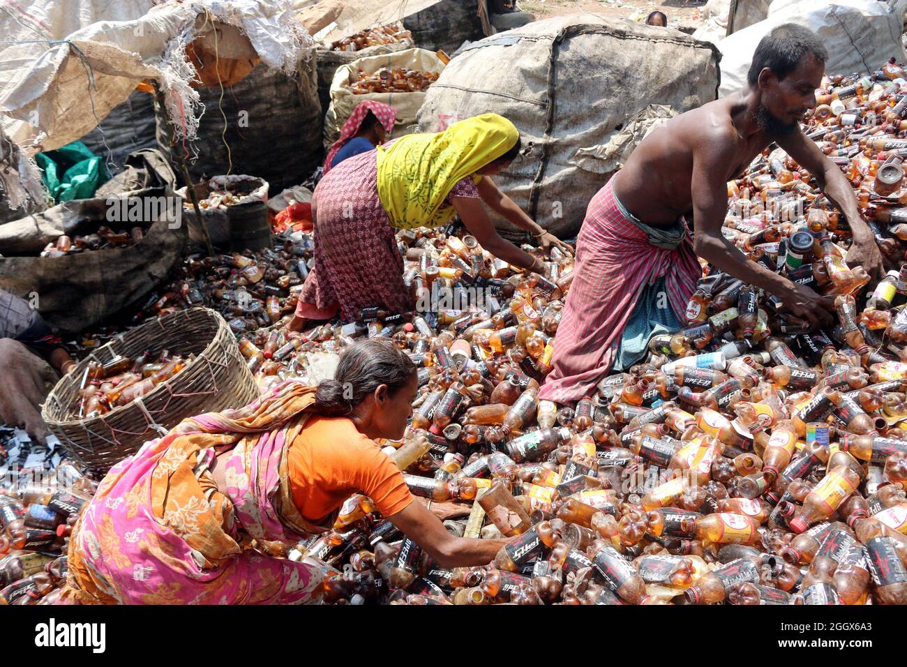 Non Exclusive DHAKA,BANGLADESH SEPTEMBER 3 Workers separate bottles