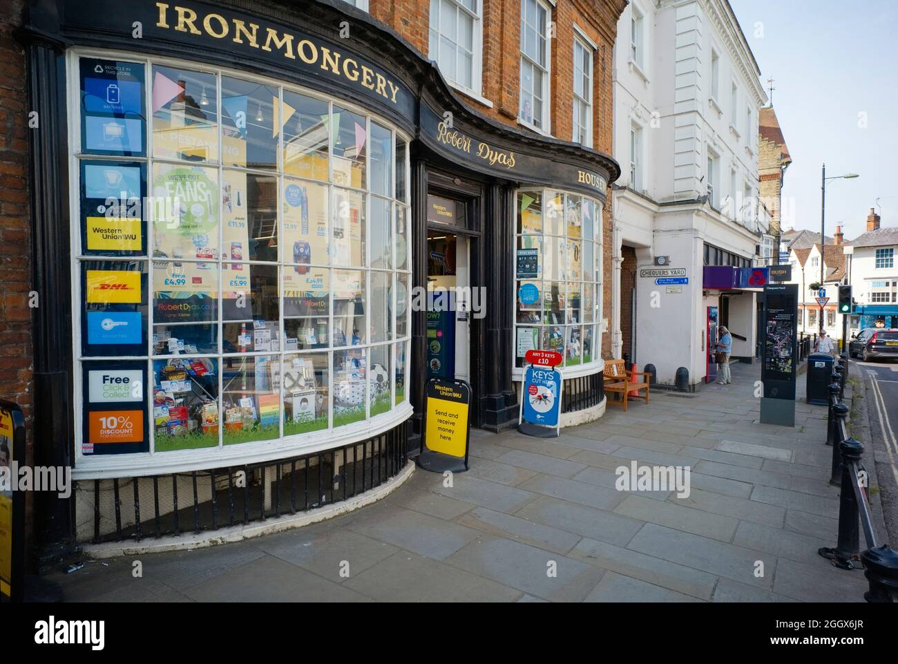 Robert Dyas ironmongery shop with double bow fronts in the High Street, Dorking Stock Photo