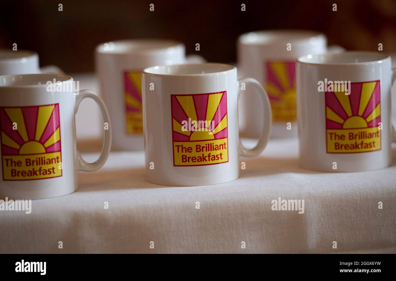 Brilliant Breakfast mugs on display during a meeting at Clarence House, London, between the Duchess of Cornwall and young women, who have been supported by the Prince's Trust, ahead of the charity's Brilliant Breakfast campaign. Picture date: Friday September 3, 2021. Stock Photo