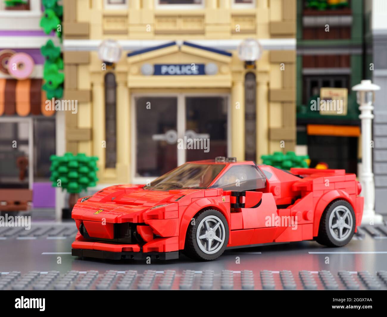 Tambov, Russian Federation - July 02, 2021 Lego Ferrari F8 Tributo car by LEGO Speed Champions on a city street Stock Photo