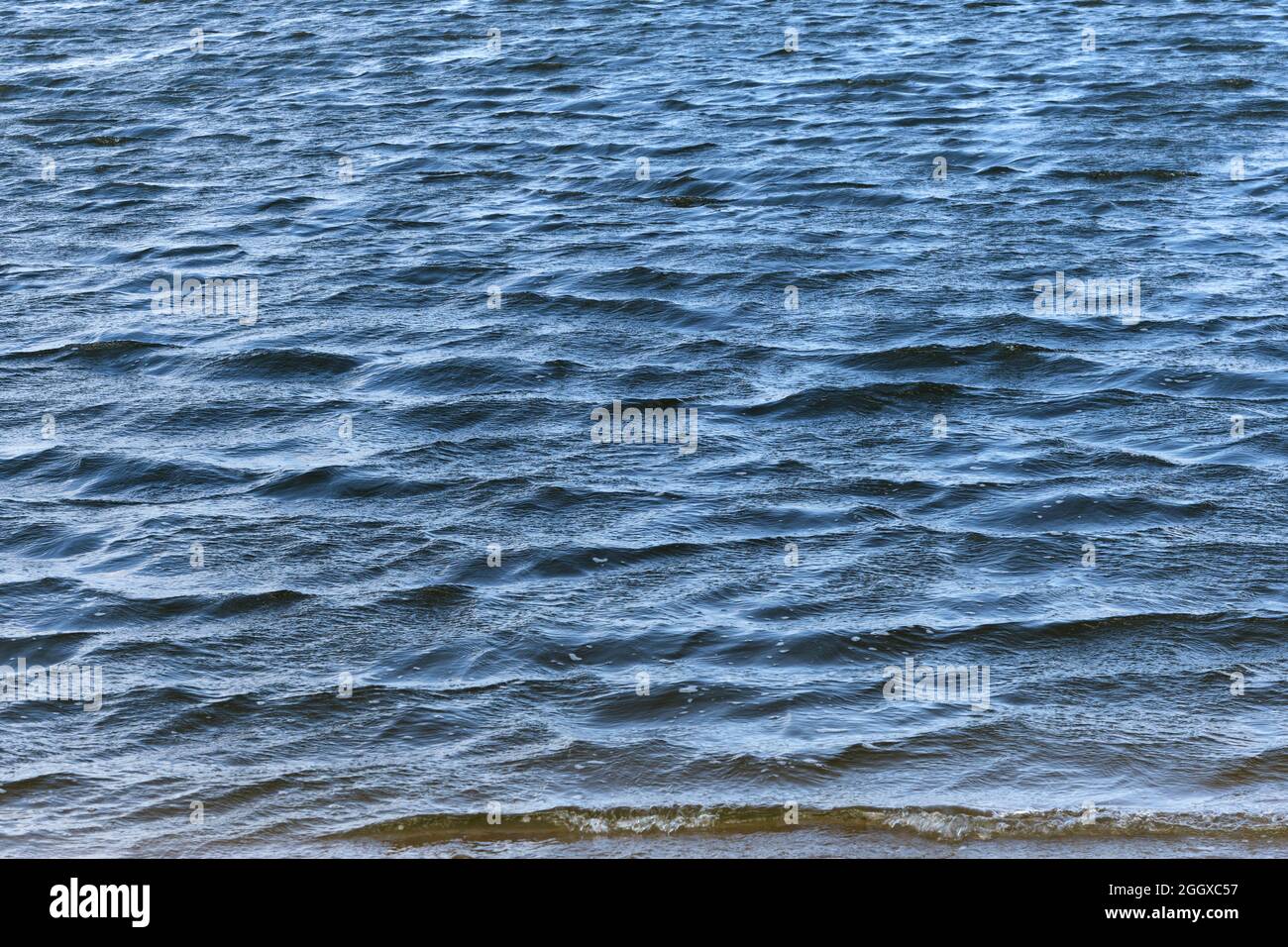 Little waves on the water. Background and texture Stock Photo