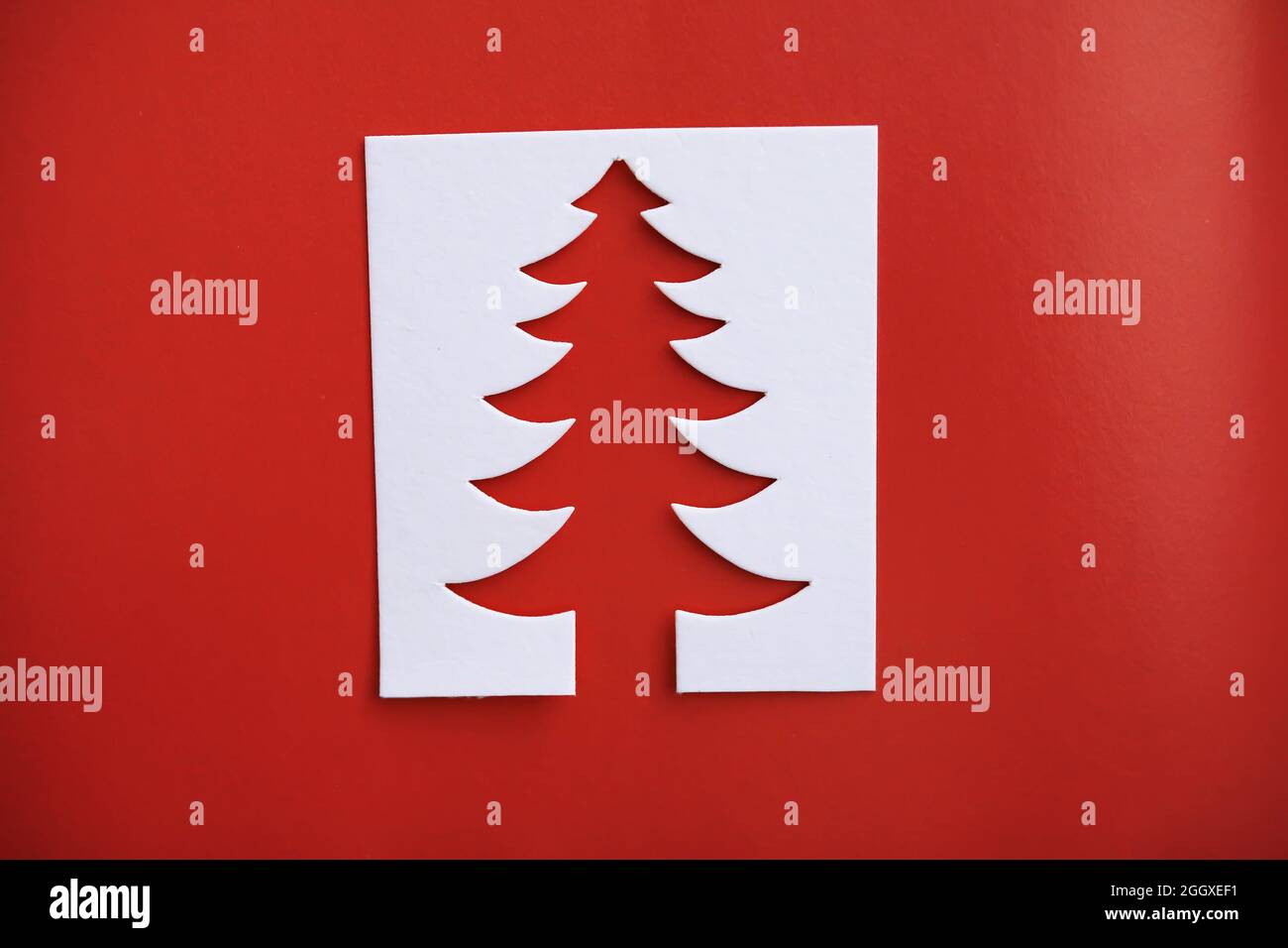 Christmas tree paper cutting design papercraft card. White, red and ...