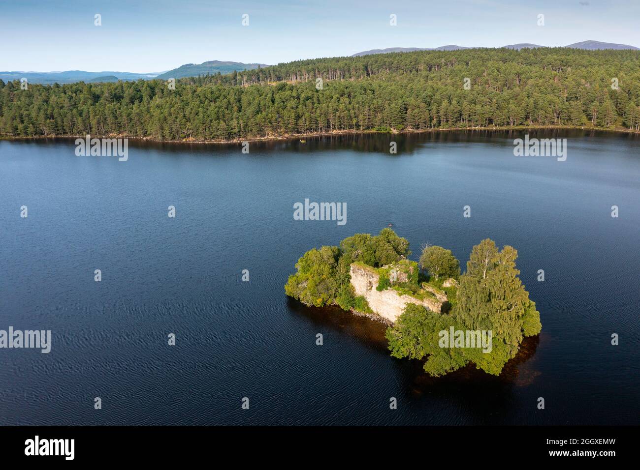 Aerial view from drone of ruin of Loch an Eilein Castle on Loch an Eilein in Rothiemurchus, Cairngorms National Park, Scotland UK Stock Photo