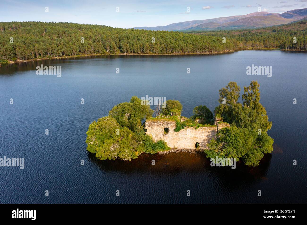 Aerial view from drone of ruin of Loch an Eilein Castle on Loch an Eilein in Rothiemurchus, Cairngorms National Park, Scotland UK Stock Photo