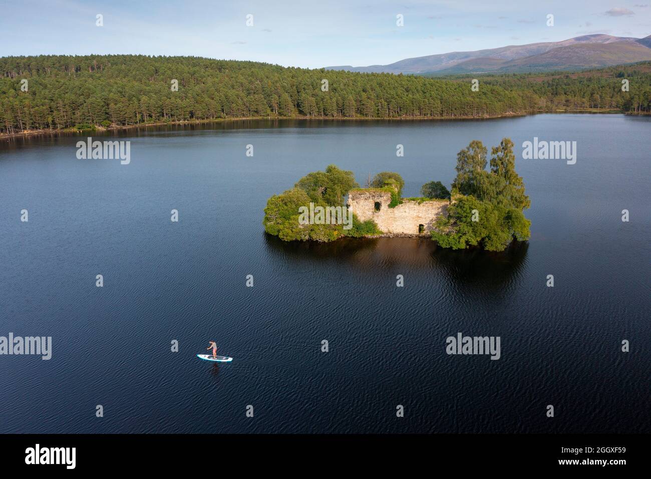 Aerial view from drone of ruin of Loch an Eilein Castle on Loch an Eilein in Rothiemurchus, Cairngorms National Park, Scotland UK Stock Photo