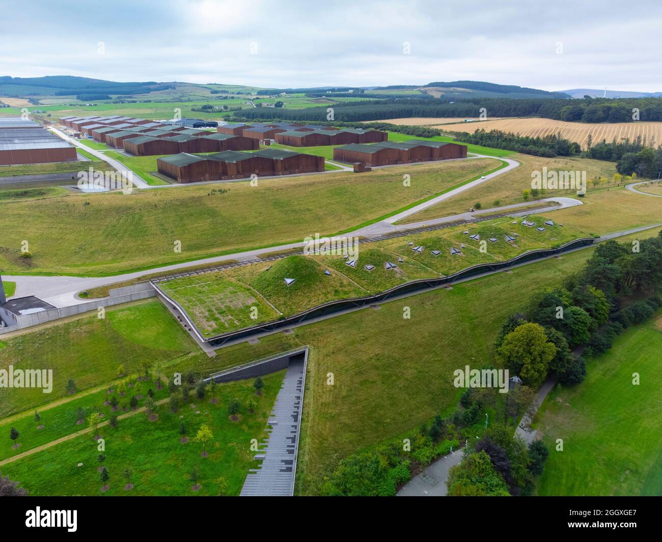 Aerial view from drone of Macallan  scotch whisky distillery visitor centre and warehouses on Speyside at Craigellachie, Moray, Scotland, UK Stock Photo