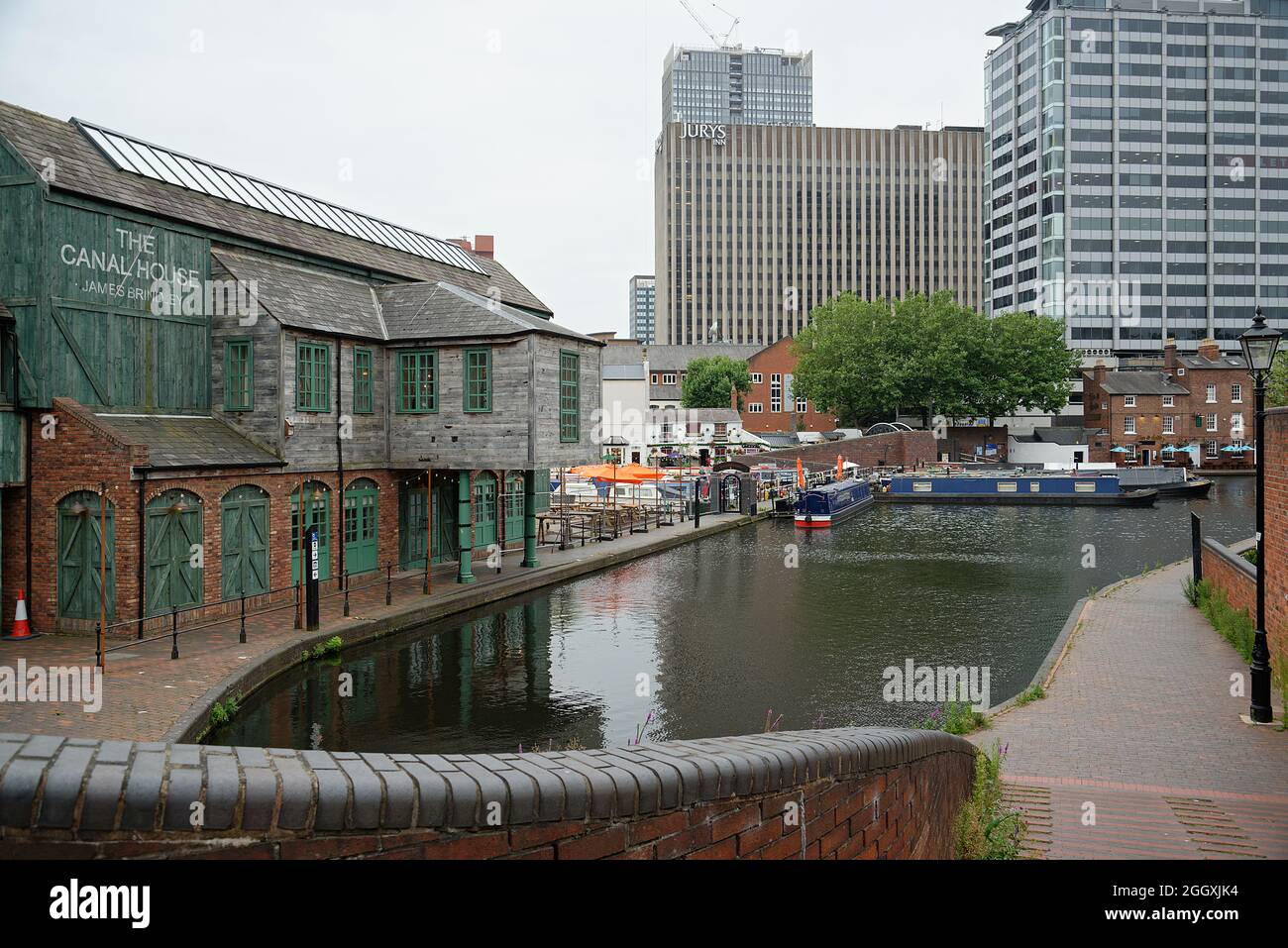 Canal, restaurants, walkway in the city of Birmingham, England Stock