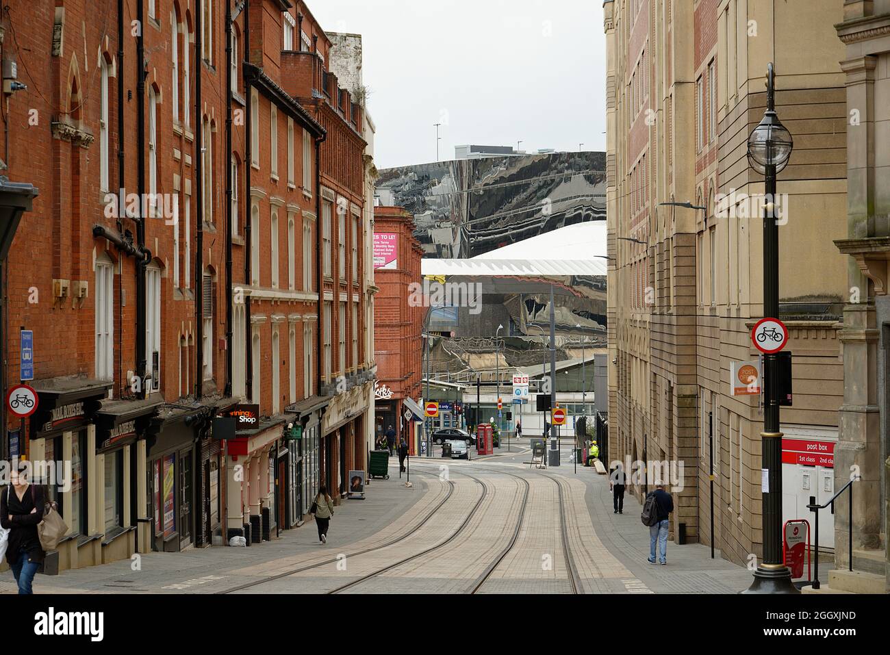 Pinfold Street and buildings in Birmingham, West Midlands, England, UK. Birmingham New Street station in the distance. Stock Photo