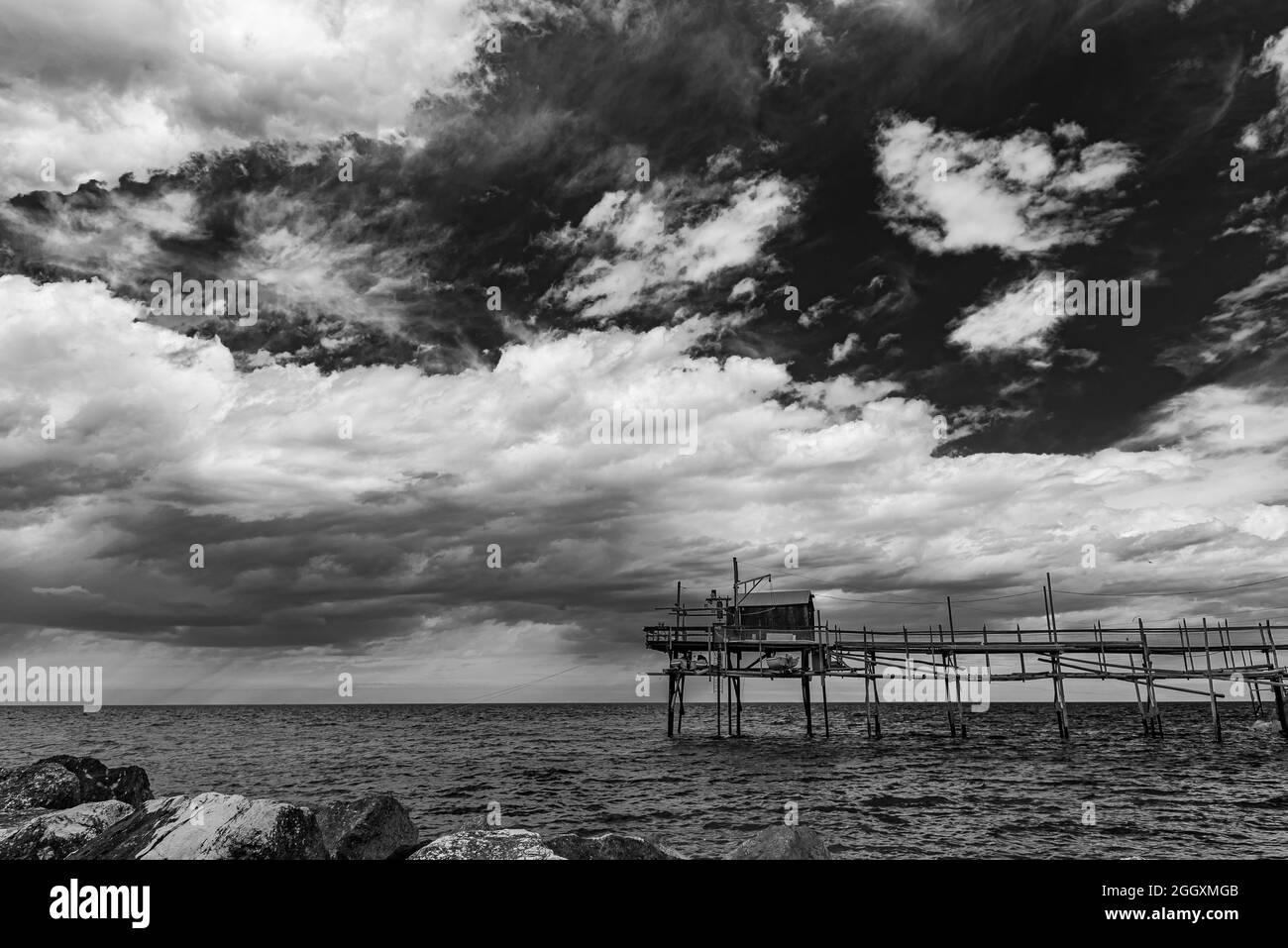 At the foot of the ancient village of Termoli, the Promenade of the Trabucchi winds its way, a portion of the coast from which you have access to the Stock Photo