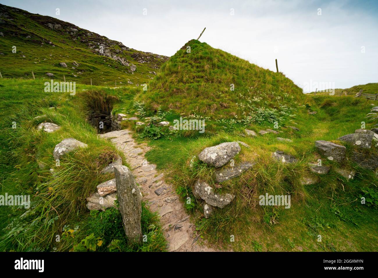 Reconstructed Iron Age house at Bosta on Isle of Lewis, Outer Hebrides, Scotland, UK Stock Photo