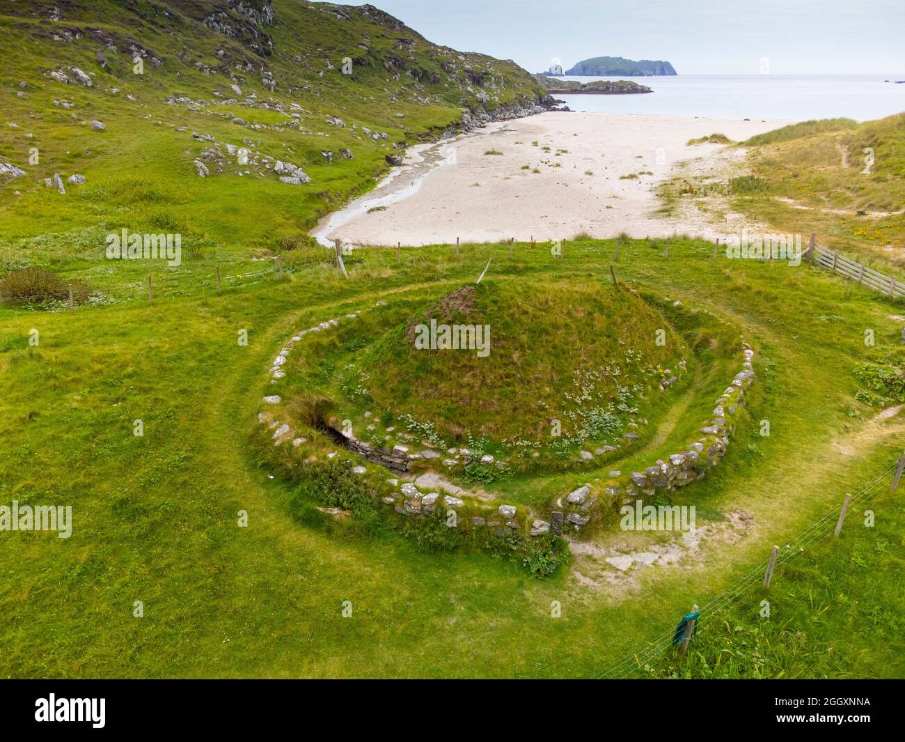 Aerial view from drone of reconstructed Iron Age house at Bosta on Great Bernera , Isle of Lewis, Outer Hebrides, Scotland, UK Stock Photo