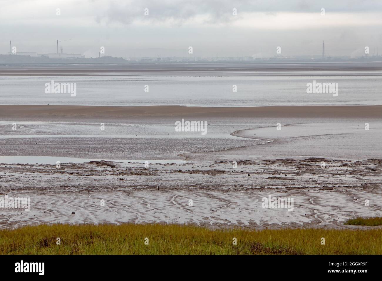 Small beginnings as the Mersey Tidal Bore passes Hale Head Stock Photo