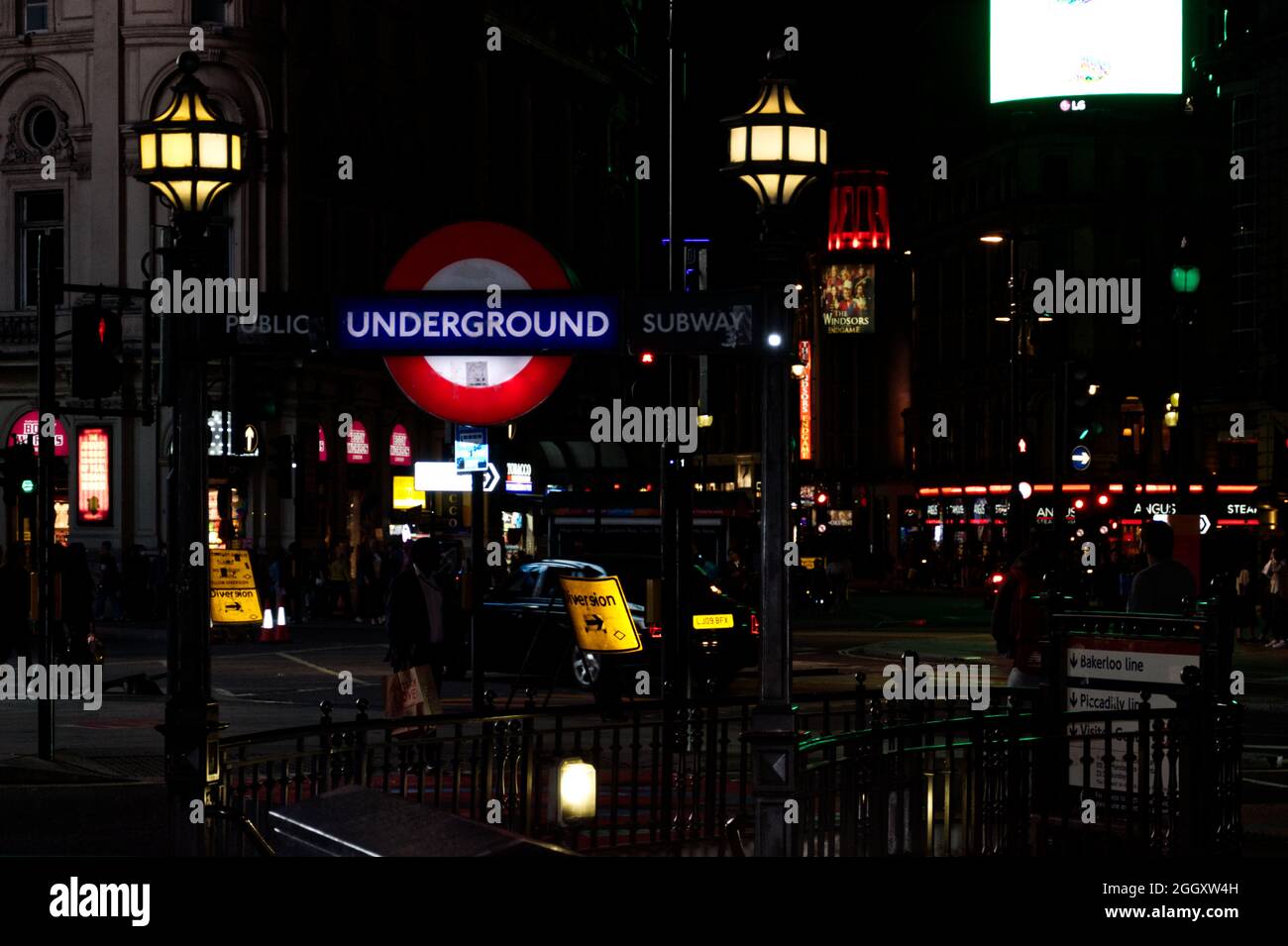 London Underground sign at night Stock Photo