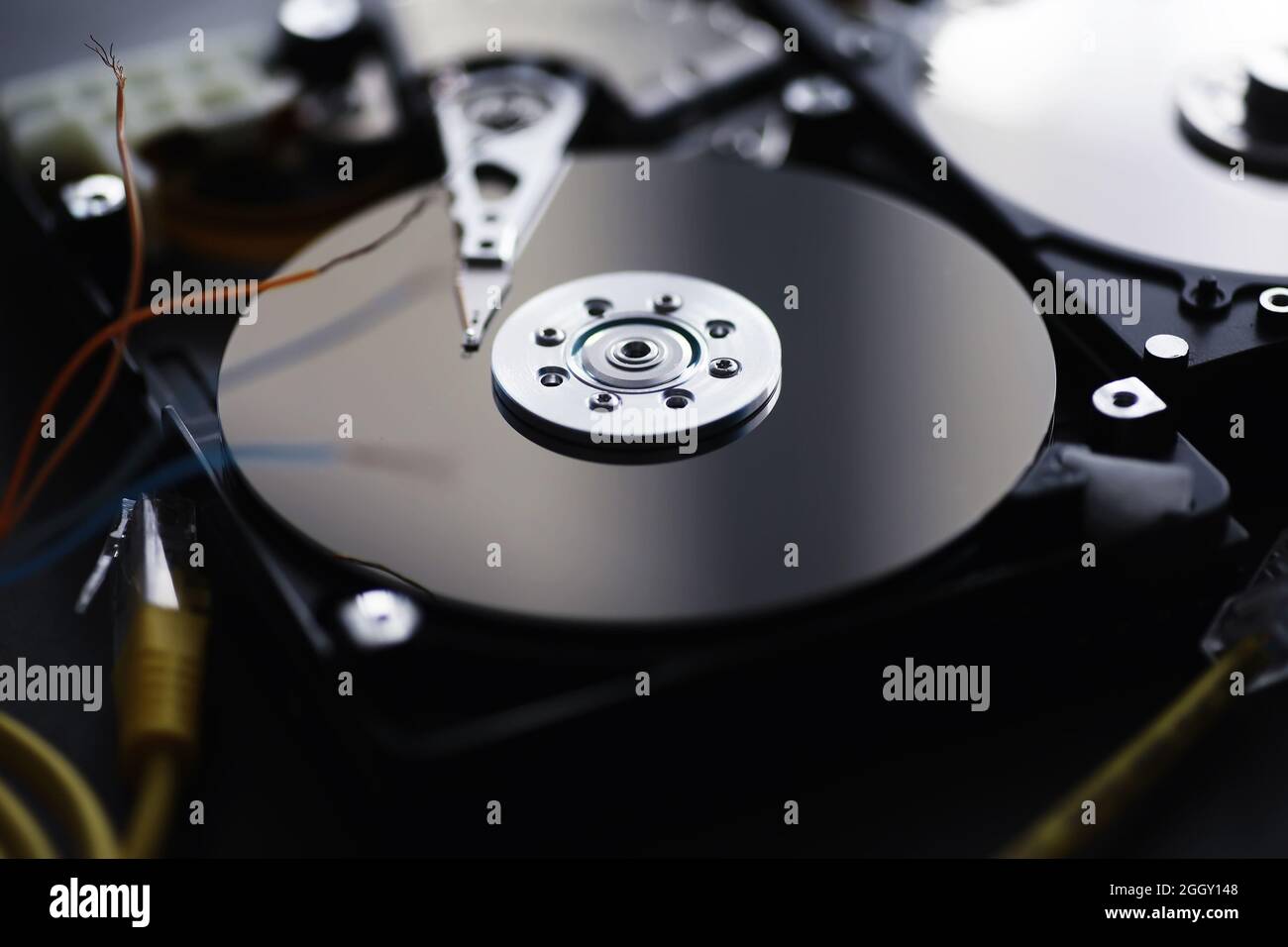 Computer accessories. The disassembled hard drive. Repair components PC.  Broken external hard drive. Computer background Stock Photo - Alamy