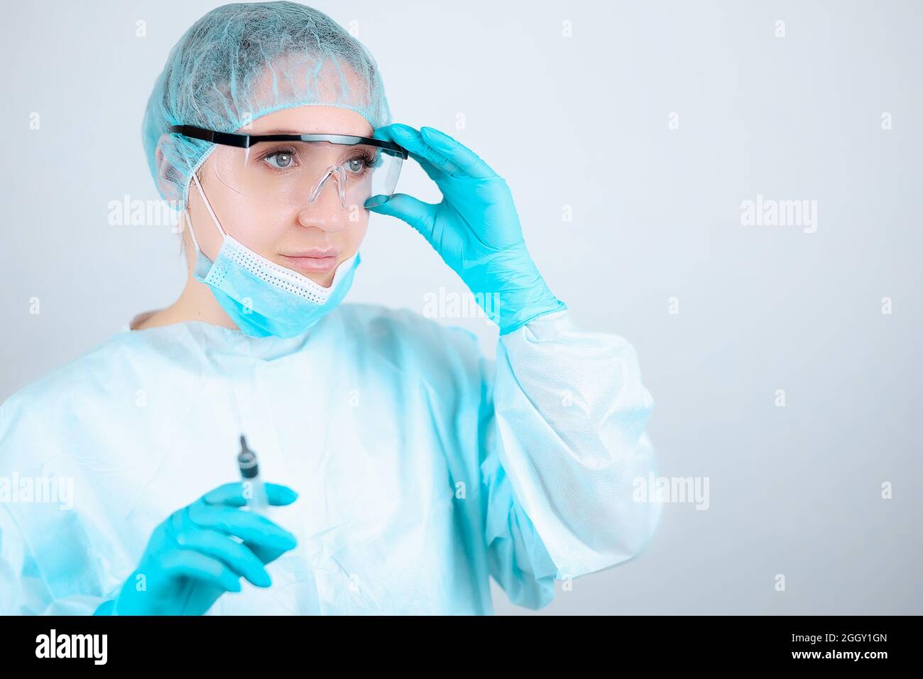 Nurse mask gown patient hi-res stock photography and images - Alamy