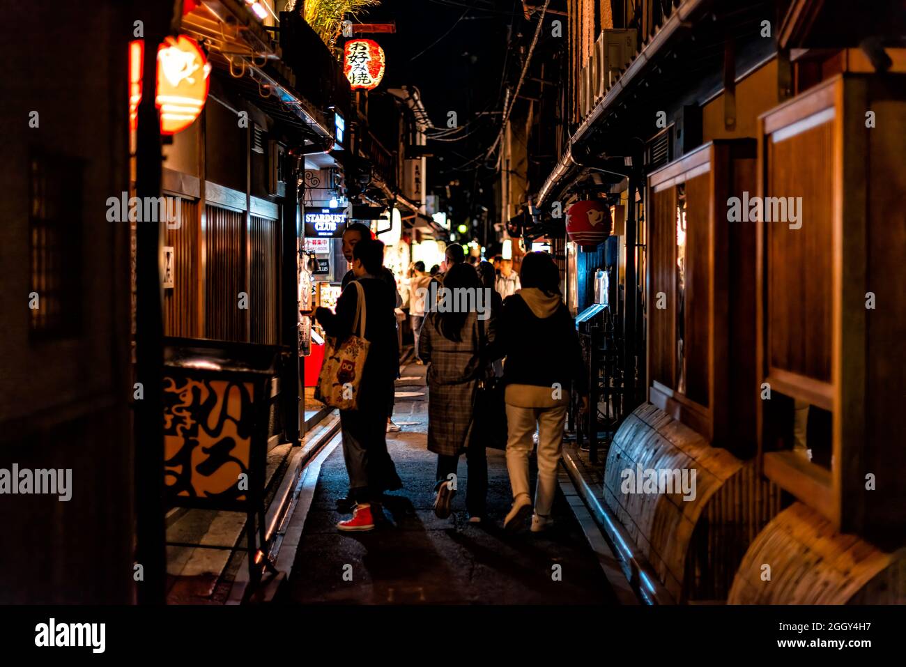 Kyoto, Japan April 16, 2019 People on dark narrow famous Pontocho