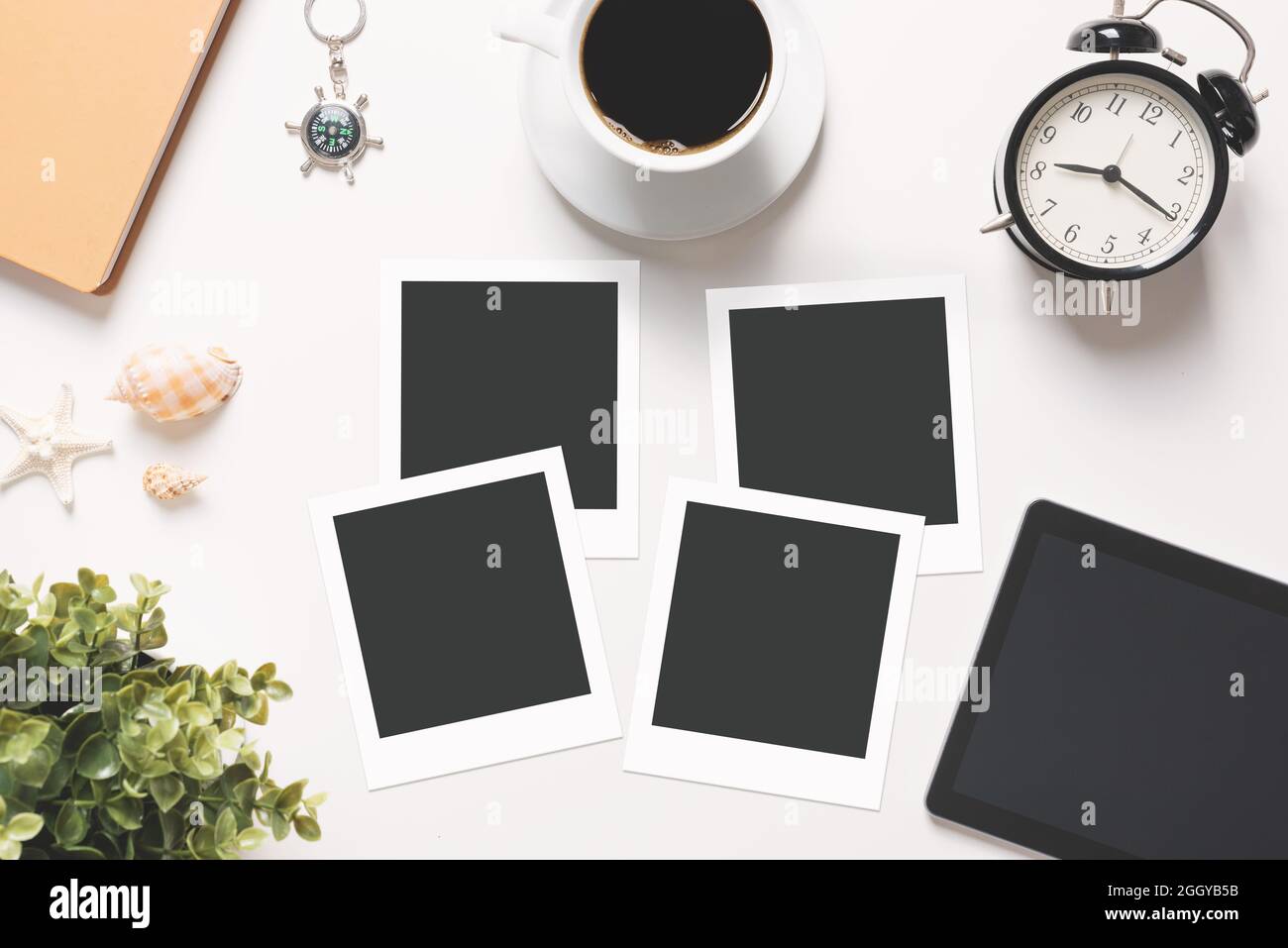 Blank photo frames. Printed photographs, photo lab concept, top view