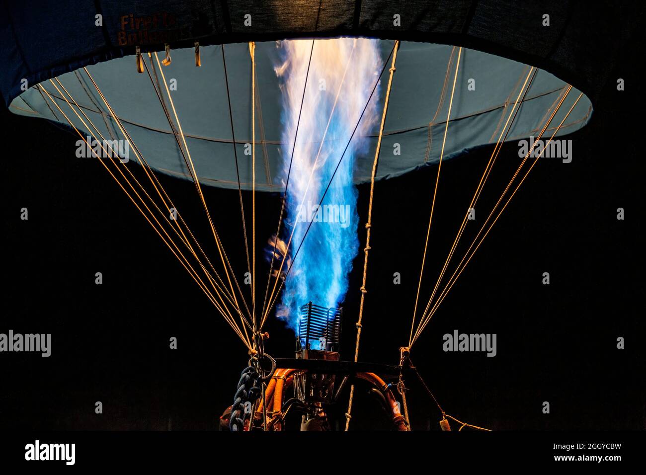 Inflating hot air balloon with propane flame, Albuquerque International Balloon Fiesta, Albuquerque, New Mexico USA Stock Photo