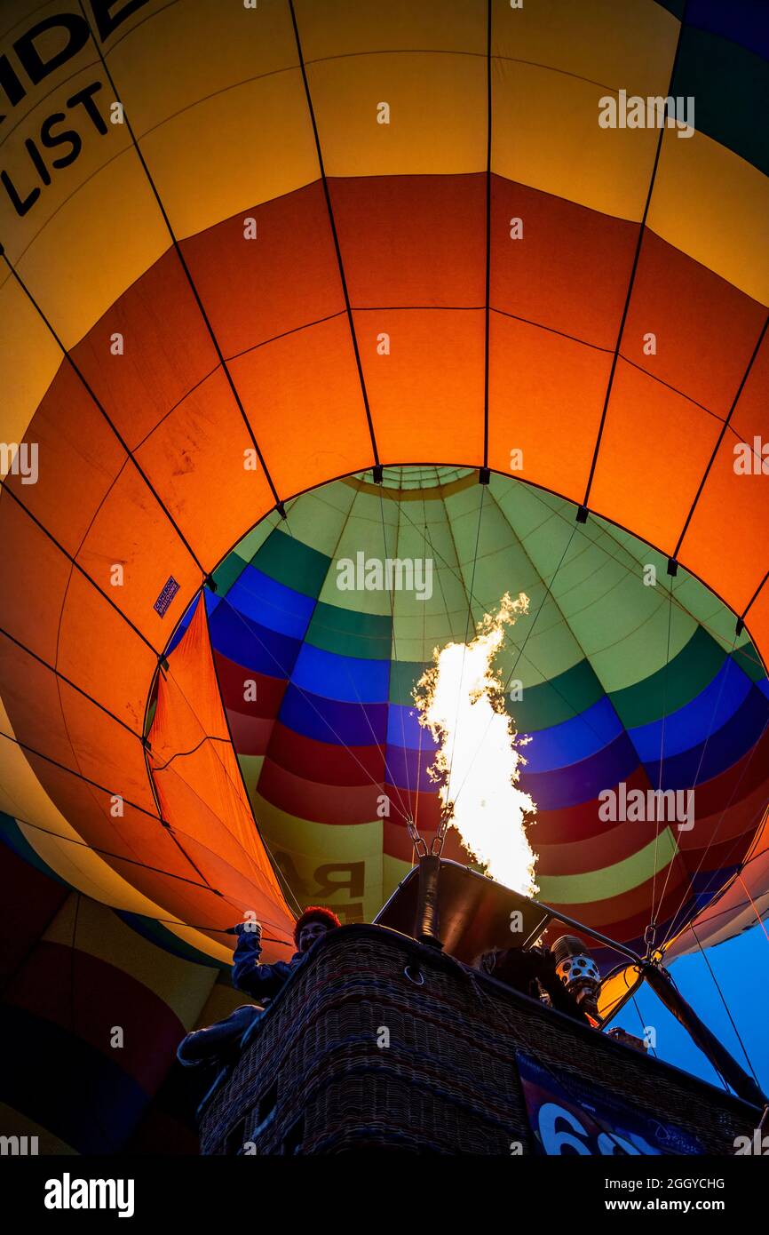 Hot air balloon with propane flame, lifting off, Albuquerque International Balloon Fiesta