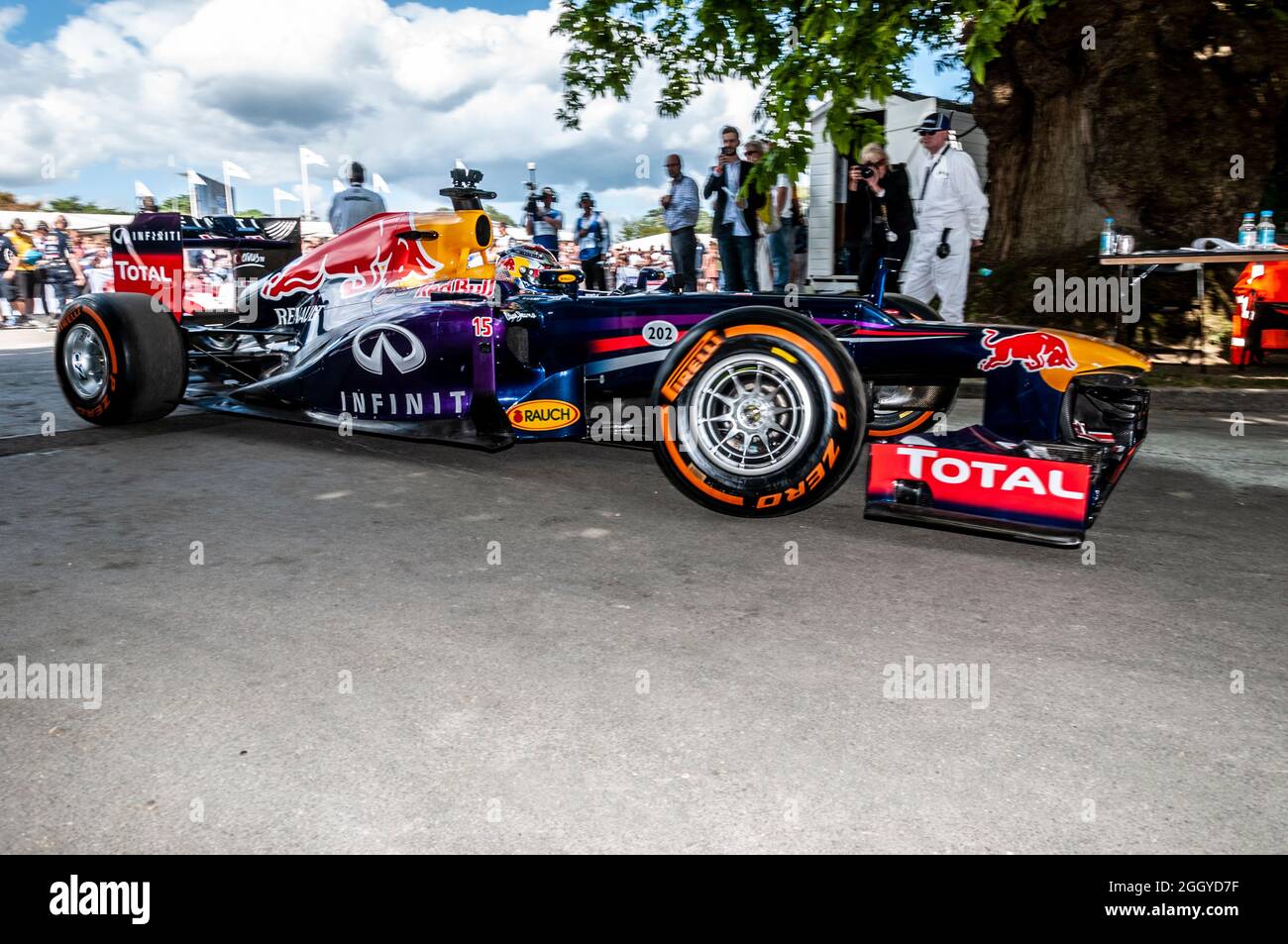 Red Bull RB7 Formula 1, Grand Prix racing car at the Goodwood Festival of Speed motor racing event 2014, leaving the assembly area for the track Stock Photo