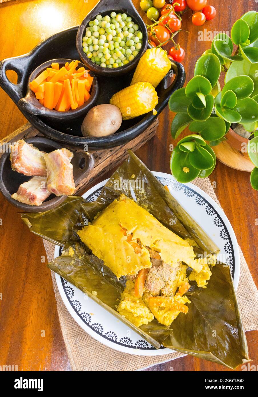 Colombian recipe steamed tamales cooked in banana leaves Stock Photo Alamy