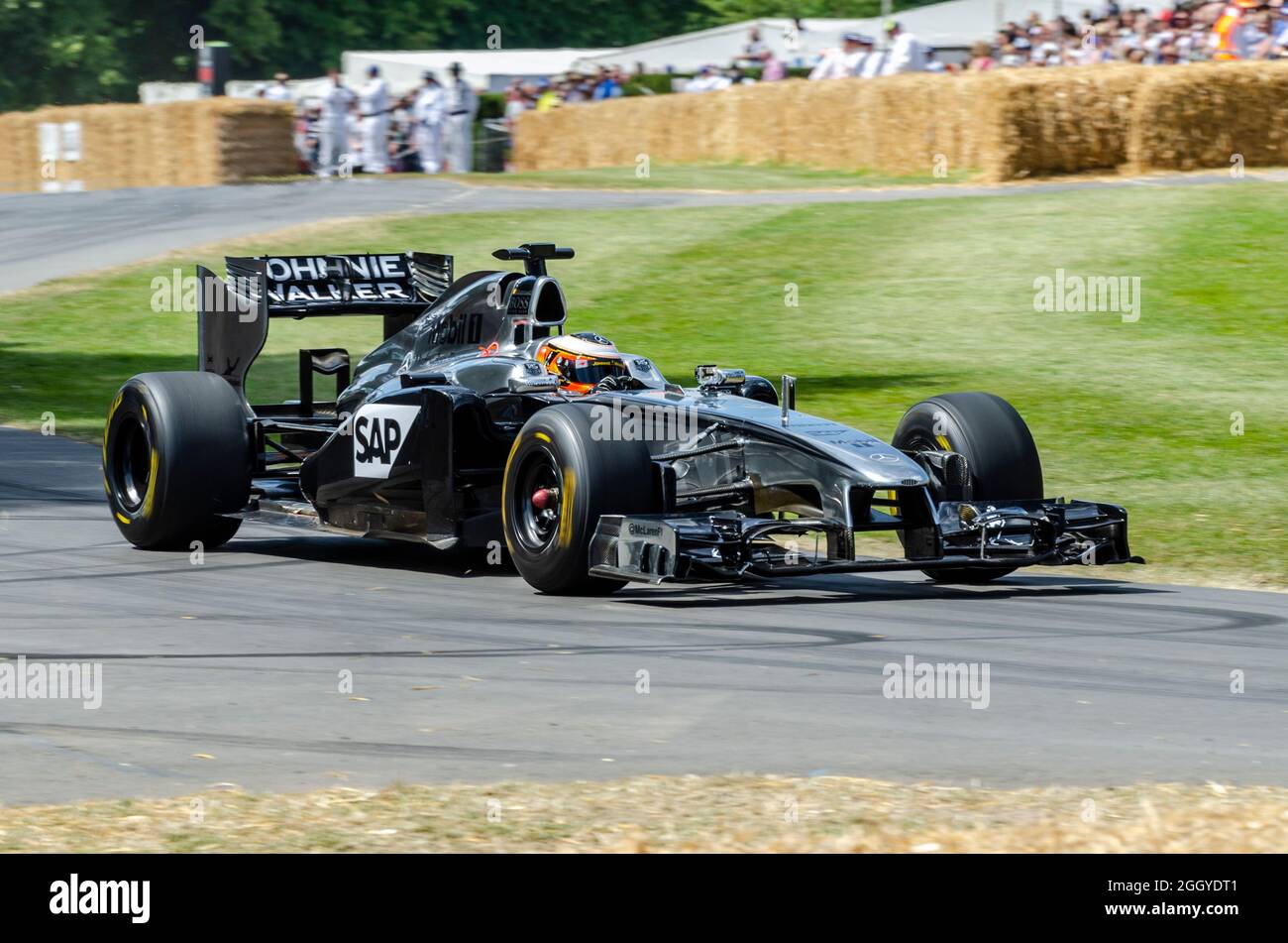 2011 McLaren MP4-26 Formula 1, F1, Grand Prix racing car at the Goodwood  Festival of Speed motor racing event 2014, driving up the hill climb track  Stock Photo - Alamy