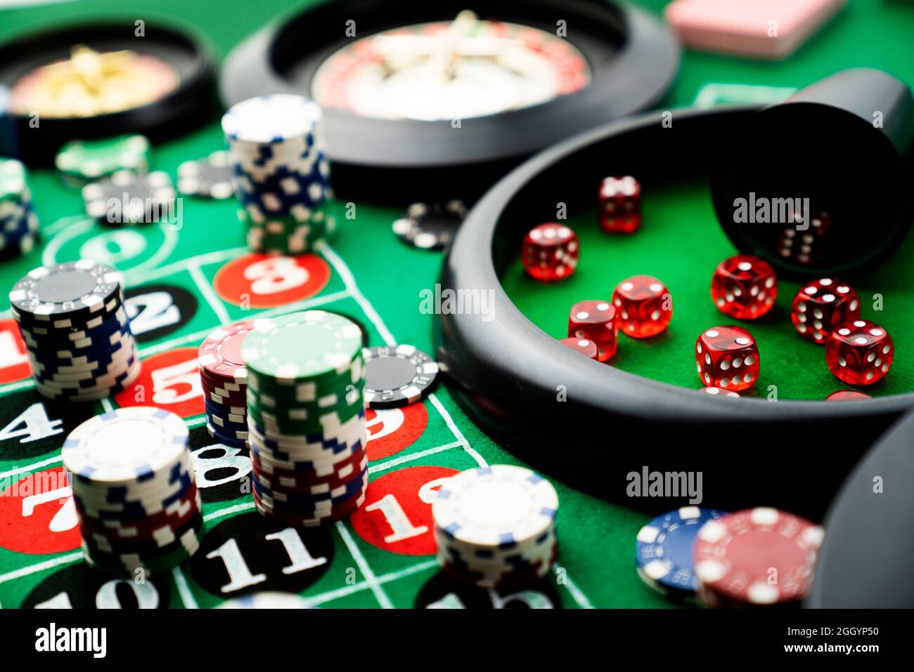 Casino table with roulette and chips Stock Photo - Alamy