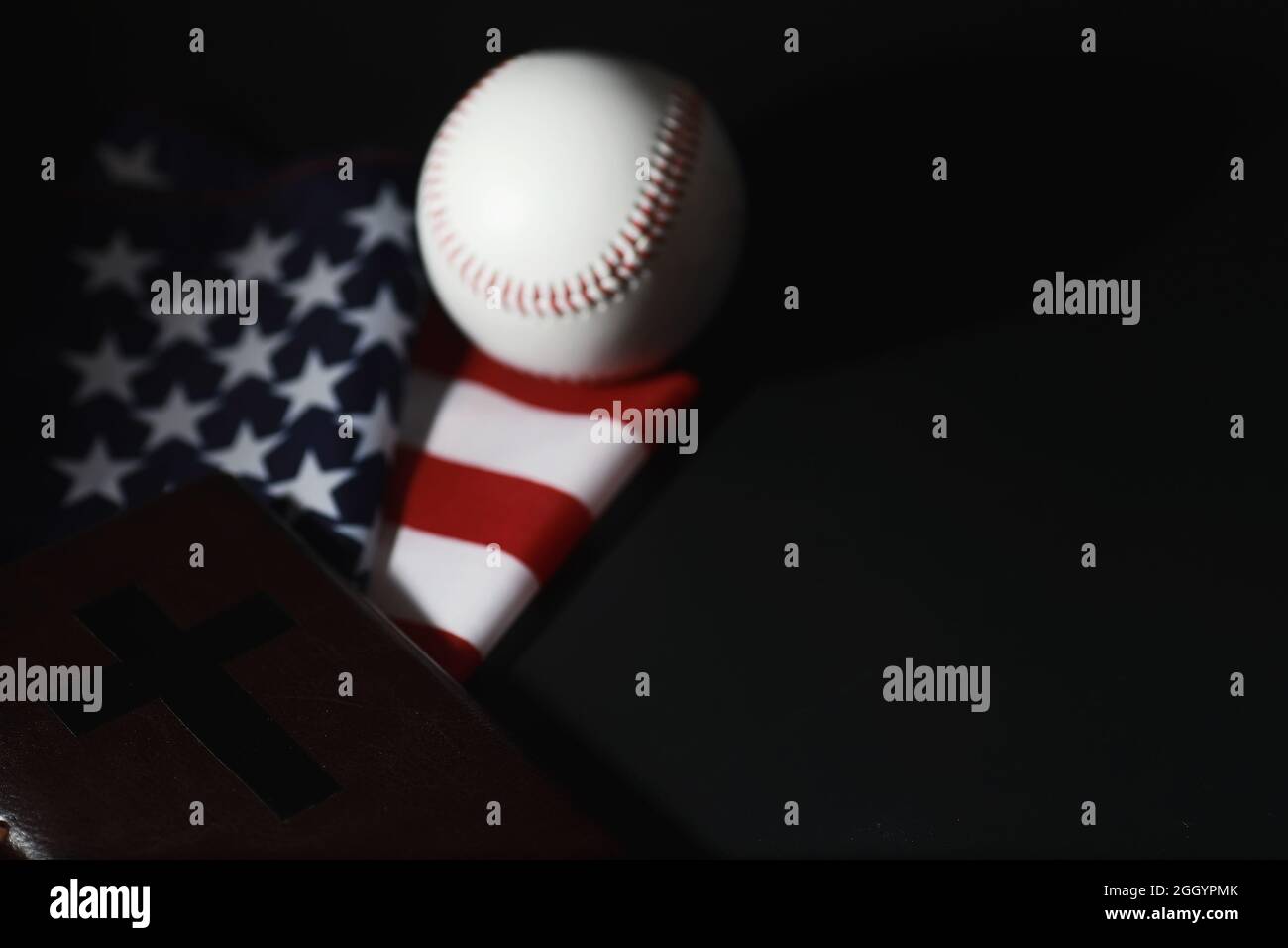 American flag and holy bible book on mirror background. Symbol of the ...