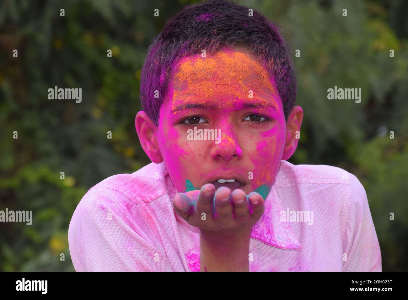 Boy Playing With Colors, In A Happy Mood. Concept For Indian Festival 