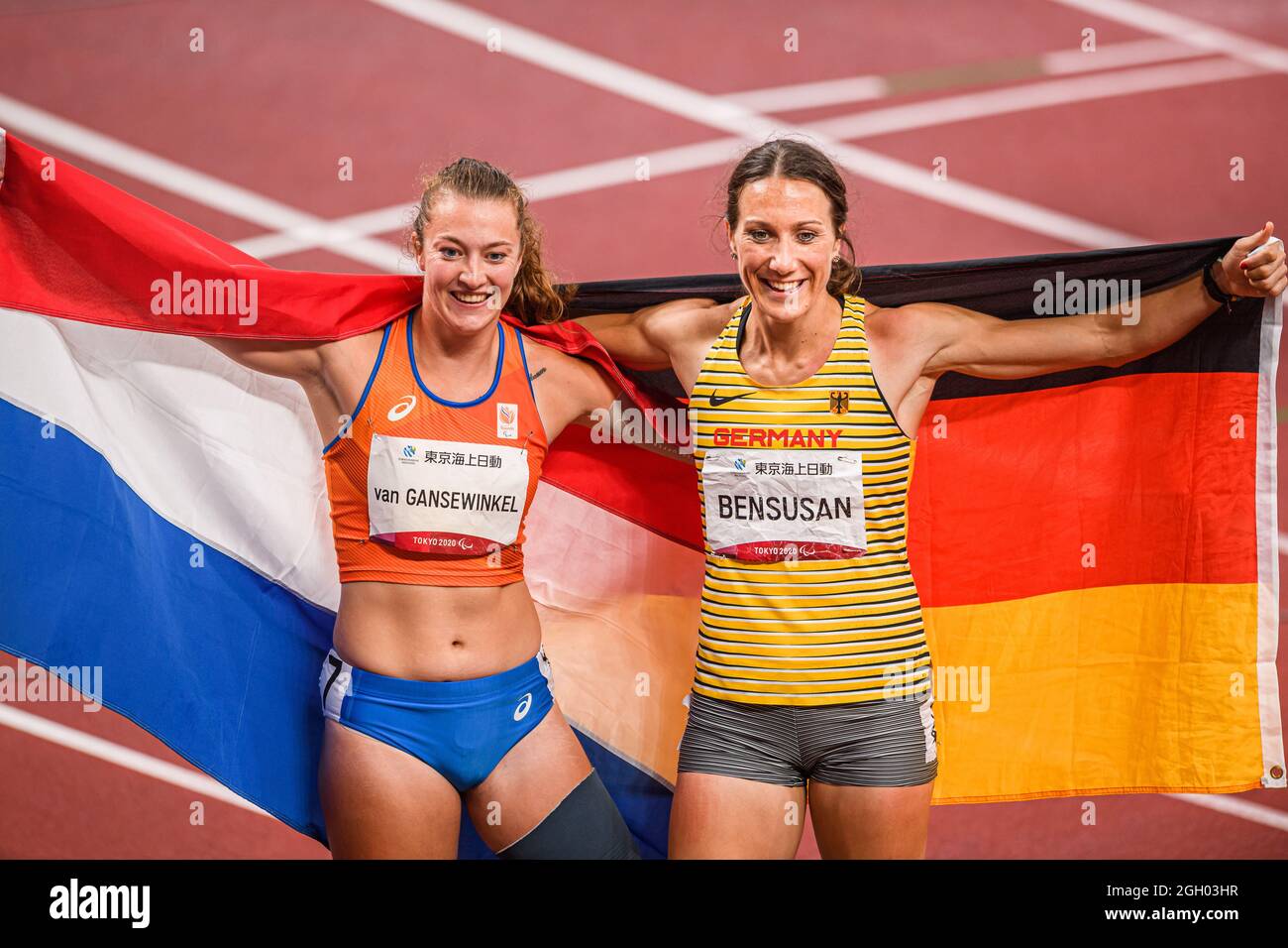 TOKYO, JAPAN. 03th Sep, 2021. Marlene van Gansewinkel (NED) (left) and Irmgard Bensusan (GER) celebrate after competing in the WomenÕs 100m - T64 Final during Track and Field events - Tokyo 2020 Paralympic games at Olympic Stadium on Friday, September 03, 2021 in TOKYO, JAPAN. Credit: Taka G Wu/Alamy Live News Stock Photo